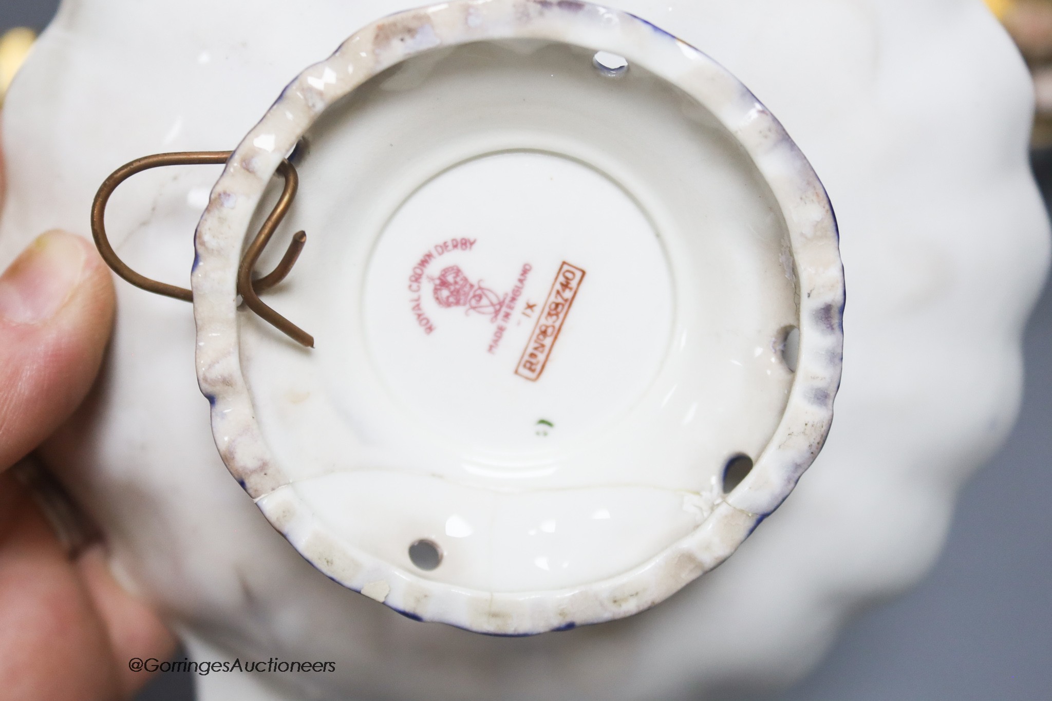 A quantity of Royal Crown Derby cups, plates and dishes